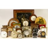 A collection of clock, including mechanical and quartz examples, including wall, alarm, anniversary,