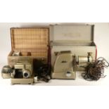 A collection of twenty six typewriters and projectors, mostly from the mid to late 20th century