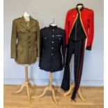 Three military uniforms, to include a British officers uniform, red jacket with gold detail, 40cm (