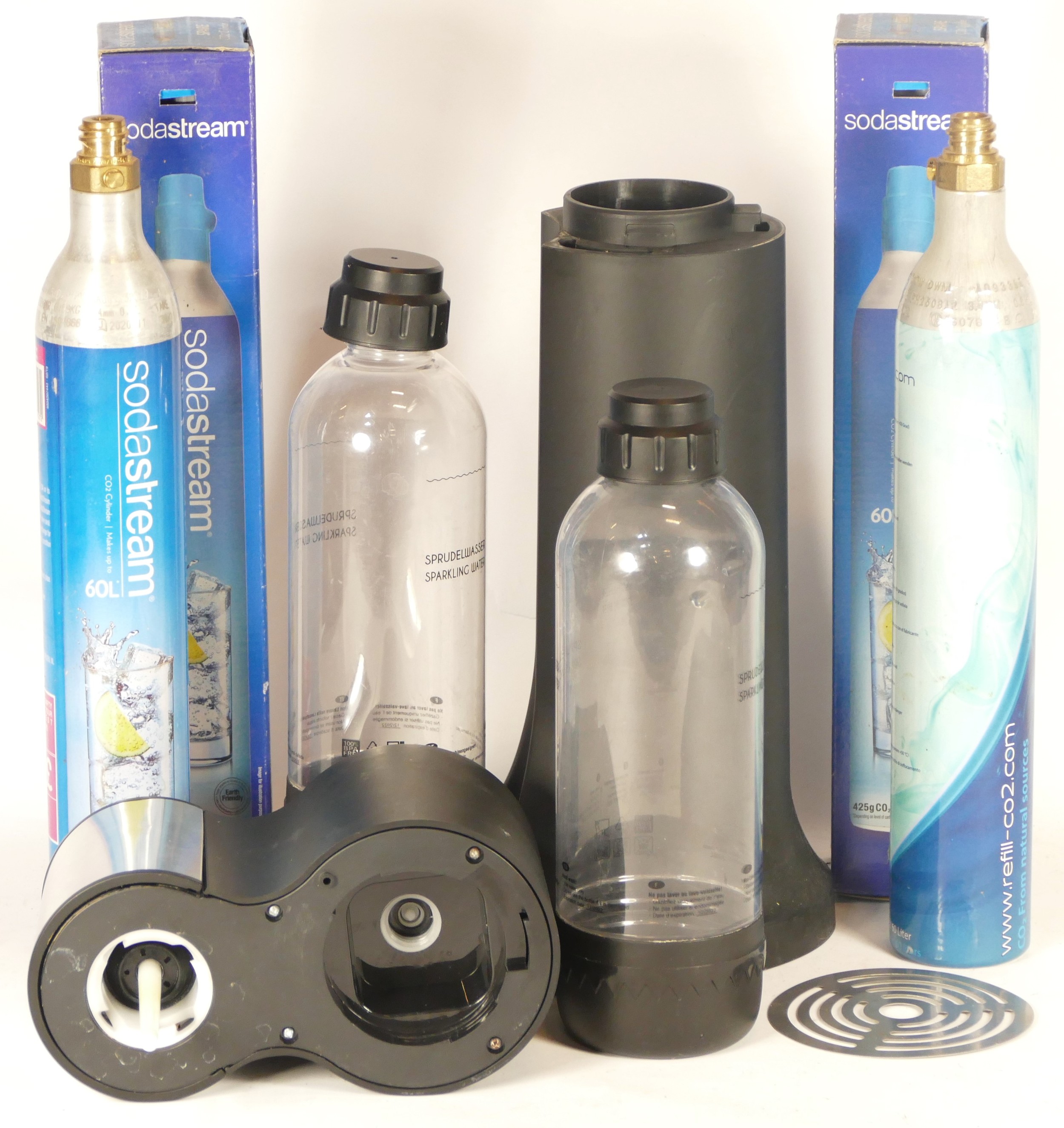 A Levivo soda stream, black with aluminium accents, with two bottles and four gas canisters