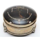 A silver and tortoiseshell trinket box, London 1921, legs bent, diameter 10.5cm