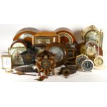 A collection of mechanical and quartz clocks, including a Wallace & Gromit alarm clock, a Smiths
