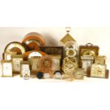 A collection of quartz and mechanical clocks, to include mantel, alarm, miniature, novelty,