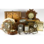 A collection of mechanical and quartz clocks, to include mantel, carriage, anniversary, wall and