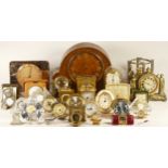 A collection of mechanical and quartz clocks, including a Art Deco desk clock, Smiths alarm