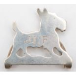 A silver money holder, stamped LUNT STERLING 510, in the form of a Scottie dog, 43 x 40mm, 13gm