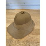 A Pith helmet, made by Helmets LTD, county style No F.135, size 57 CMS