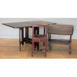 A mid 20th century mahogany drop leaf dining table, 83 x 144 x 74cm (extended), together with