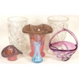 Four pieces of art glass, to include a two glass baskets, a tulip shaped pink vase, a small blue