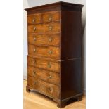 A 19th century mahogany chest-on-chest, the base with three long graduated drawers below two short