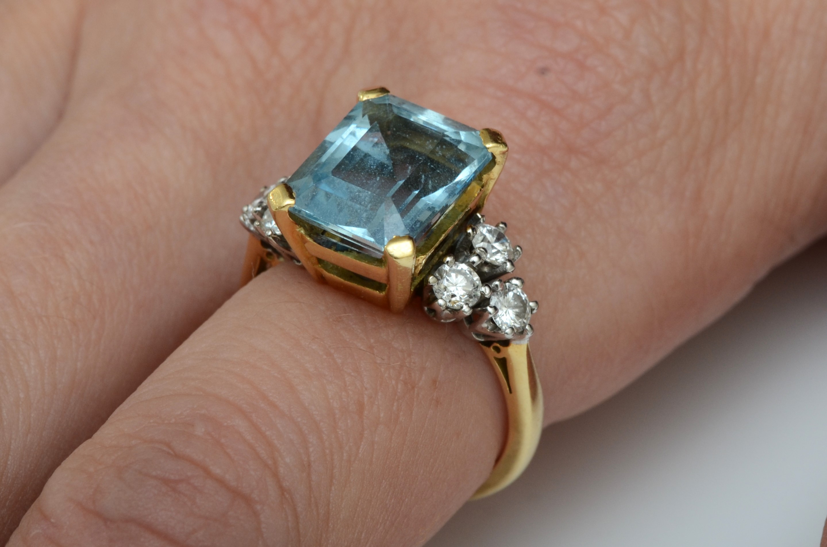 An 18ct gold aquamarine and diamond dress ring, claw set with a step cut stone, 11 x 9mm, - Image 5 of 6