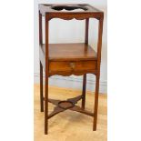 A Victorian mahogany washstand, having single frieze drawer, with lower stretcher on stile supports.