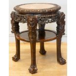 A 19th century Chinese hardwood and marble circular occasional table, with pierced floral frieze,
