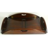 A 19th century mahogany butlers tray, having panelled centre with reeded curved drop down sides.