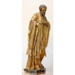 A continental sculpted and gilt painted limewood model of a saint, in the 16th century style, 101cm.