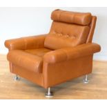 A 1970s tan leather armchair, button back with spayed armrests, raised on chrome feet. W87, H37 (