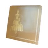 A substantial overmantle mirror, circa 1950's, the etched glass depicting a pin up girl. 117x117cm