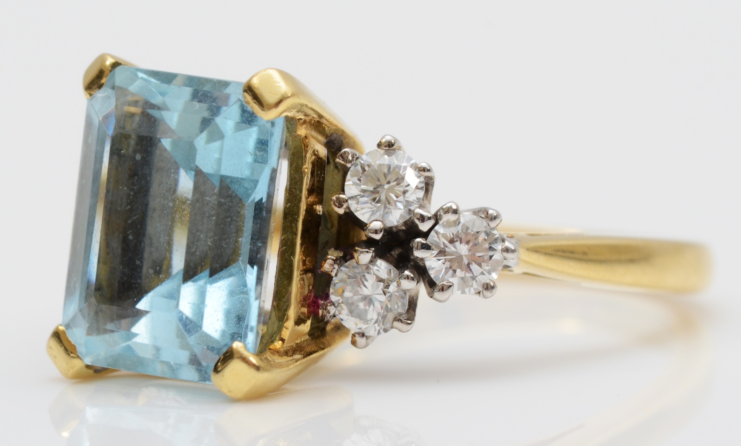 An 18ct gold aquamarine and diamond dress ring, claw set with a step cut stone, 11 x 9mm, - Image 3 of 6