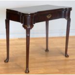 A Georgian mahogany fold over side/card table, of rectangular form with projecting turret corners,