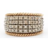 A 9ct gold five row diamond ring, set with brilliant cut stones, stated weight 1.0cts, estimate J/K,