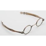 A Victorian silver pair of spectacles, by TM, Birmingham 1839, with sliding arms