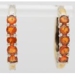 A pair of unmarked gold and sunstone ear rings, 25mm, 6.3gm