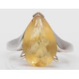 A 9ct white gold single stone citrine ring, claw set with a pear shape stone, 15 x 10mm, N, 3.6gm