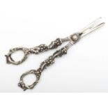 A William IV silver pair of grape scissors, makers mark poorly struck, London 1831, with cast