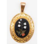 A Victorian rose gold and pietra dura oval pendant, tests as 9ct gold, floral engraved border and