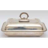 A silver rectangular entree dish, Sheffield 1931, with gadrooned border, twist off handle,
