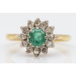 An 18ct gold emerald and diamond cluster ring, London 1976, L 1/2, 4.1gm