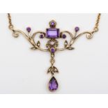 A 9ct gold amethyst and brilliant cut diamond Victorian style scroll necklace, with pear shape