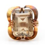 A vintage gold smokey quartz dress ring, bearing unidentified control marks and maker SS, tests as