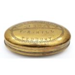 An Edwardian Welsh brass oval tobacco box, by L. Morgan, Maker, Abercwmboi, S.W., the hinged lid
