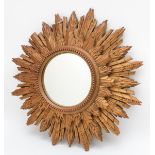 A giltwood sunburst wall mirror, verso paper label E.C Gomme, c.1960's, 49cm diameter.