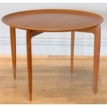A Fritz Hansen Danish teak folding side table, circa 1960-1969, model 0763. 60cm diameter.