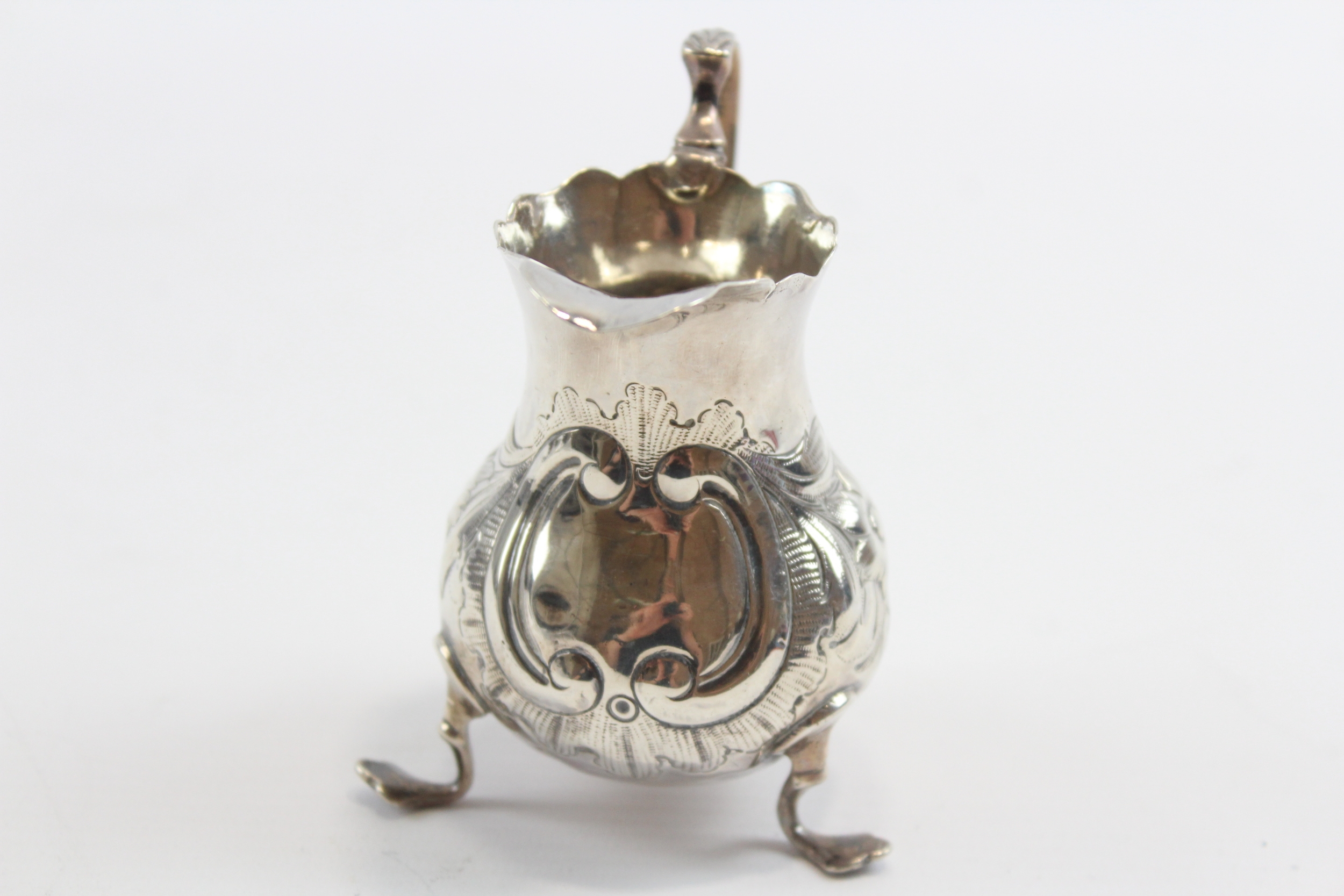 A George III silver embossed cream jug, London 1763, 9.5cm, 69gm - Image 3 of 6
