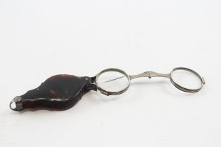 A 19th century pair of unmarked silver and tortoiseshell lorgnettes, 6.5cm closed