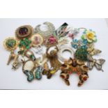 25 various costume brooches