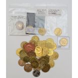 A collection of 23 half guinea gaming tokens, In Memory of the Good Old Days, 1788, and 27 other