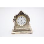 A silver desk timepiece, Birmingham 1916, initialled and dated, 9.5cm.