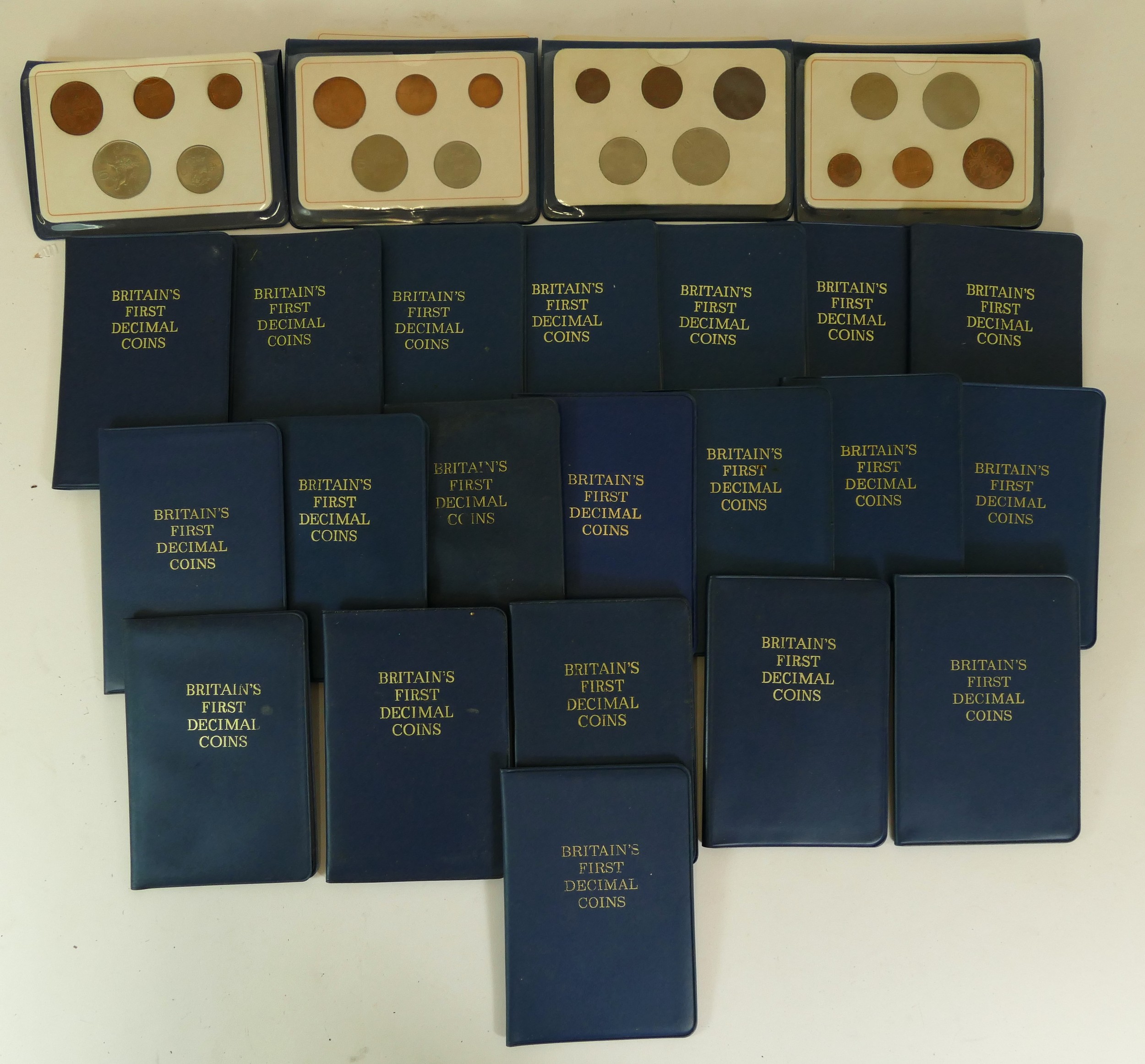 A collection of 24 Britain's First Decimal Coin sets