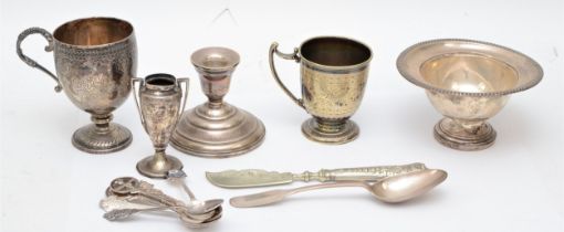 A Sterling silver pedestal bowl, diameter 14cm, loaded, a Sterling silver desk candlestick, loaded