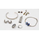 A silver ingot pendant, a silver slave bangle and other silver jewellery, 92gm