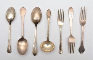 A silver trefid christening spoon and fork, by Mappin & Webb, London 1920, two other christening