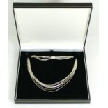 A seven row silver rope twist necklace, 39cm, 28gm, case