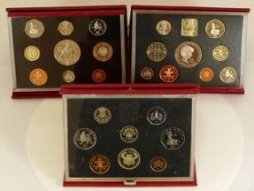 Royal Mint, three coin sets, cased