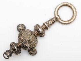 An Edwardian silver rattle, Birmingham 1904, lacking one bell and mouth piece, 9.5cm, 23gm
