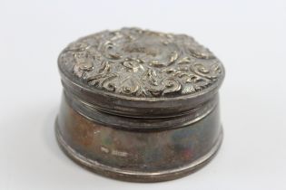 A silver lidded trinket box, Birmingham 1991, with hinged and embossed cover, 8cm, loaded