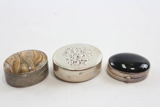 A silver and hardstone pill box, Birmingham 2000, Millennium mark, 4 x 3 x 2cm and two other